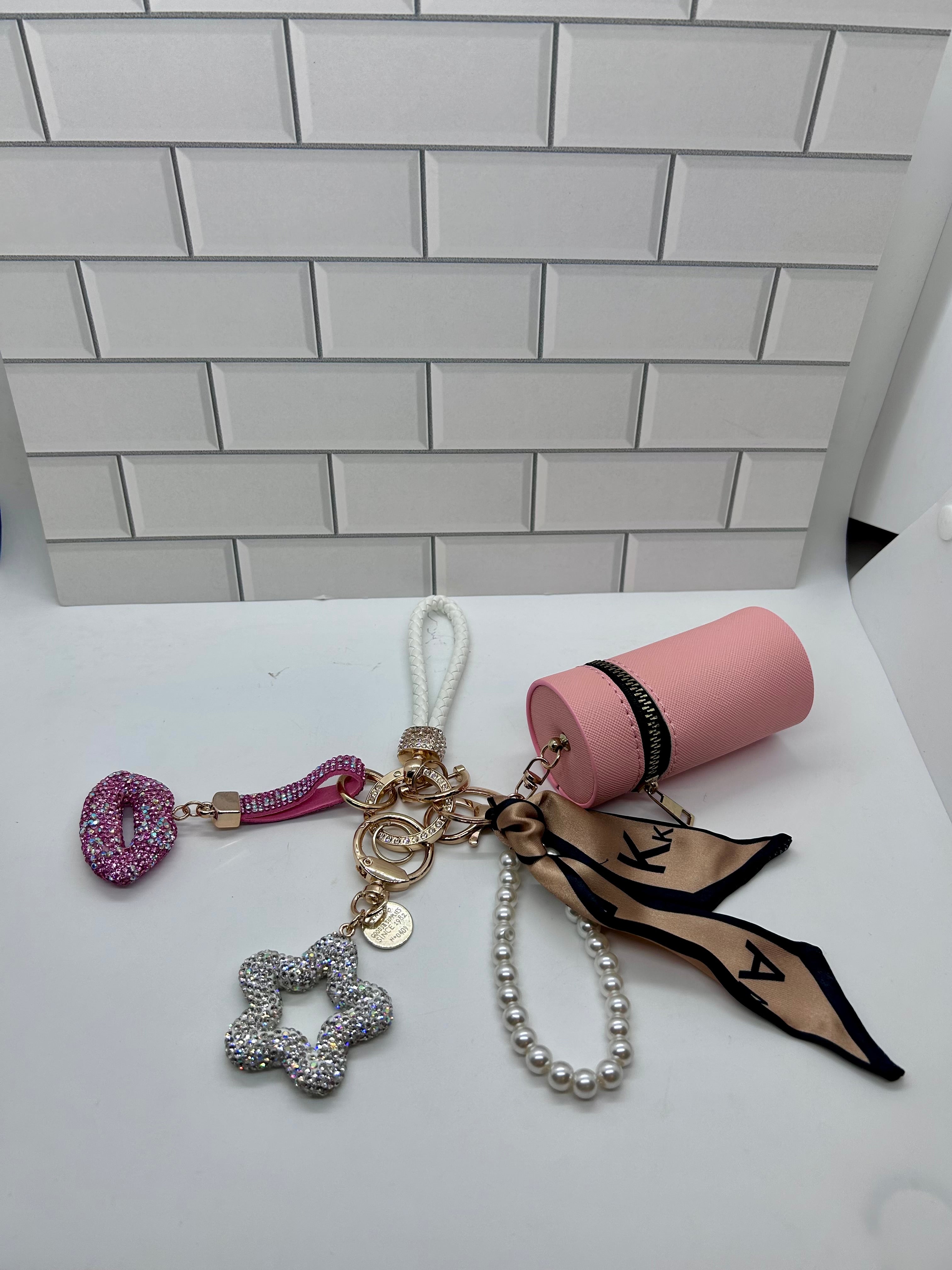White Wristlet Keychain Bundles-Orange Cylindrical Bag, White Star Charm, Pink Lip Charm