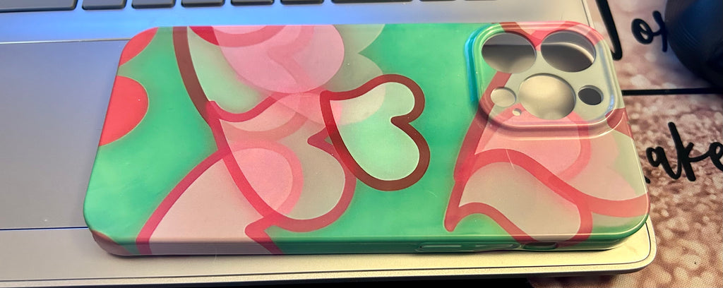 IPHONE 14 PRO MAX Phone Case Featuring a Heart Theme