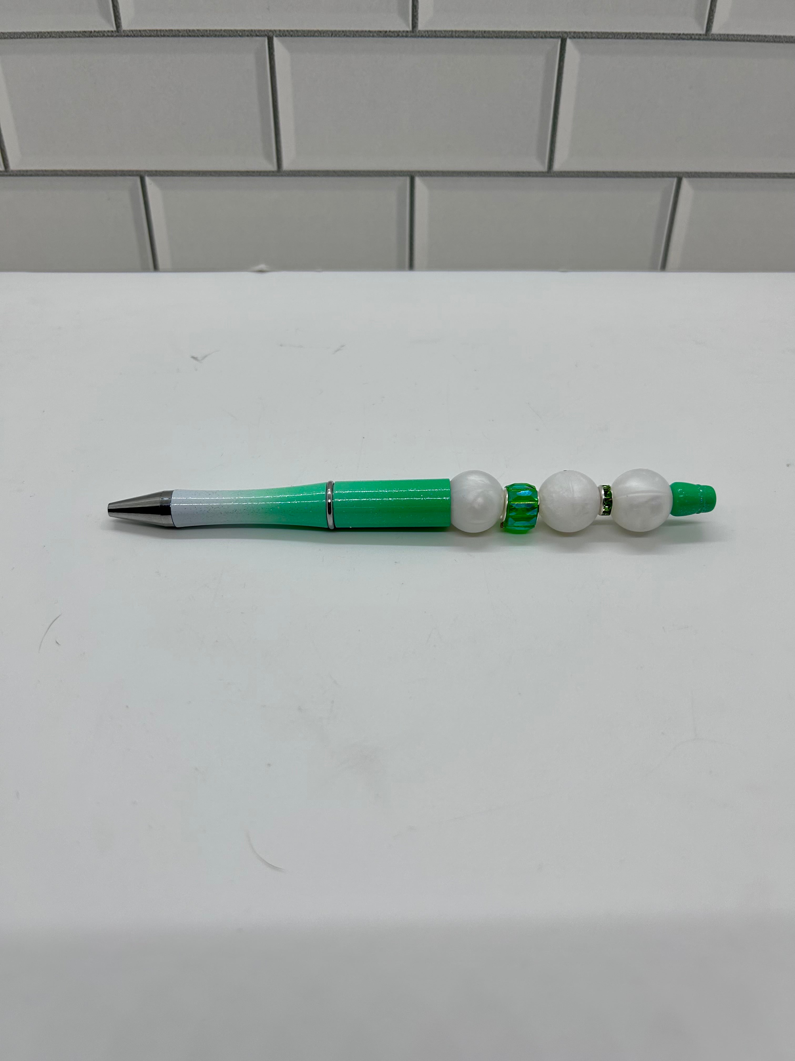 Stylo bille ombré vert en silicone à perles