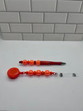 Enrouleur de badge perlé avec stylo perlé assorti - Orange