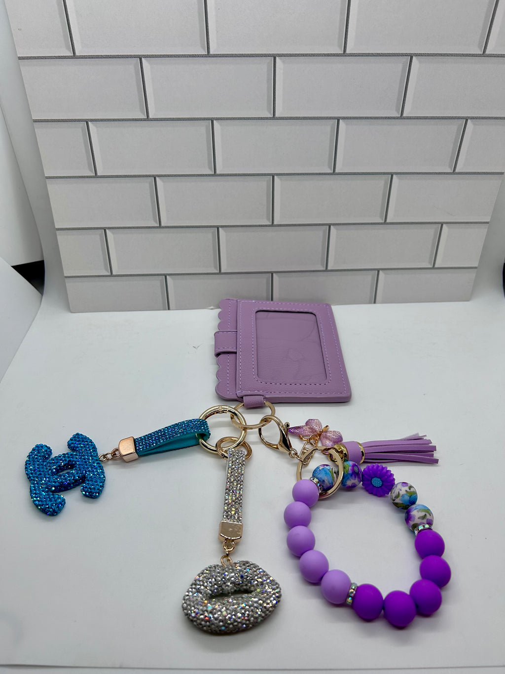 I.D. Wristlet Keychain Bundle Purple with Blue CC Charm, White Lips Charm, Silicone Bracelet