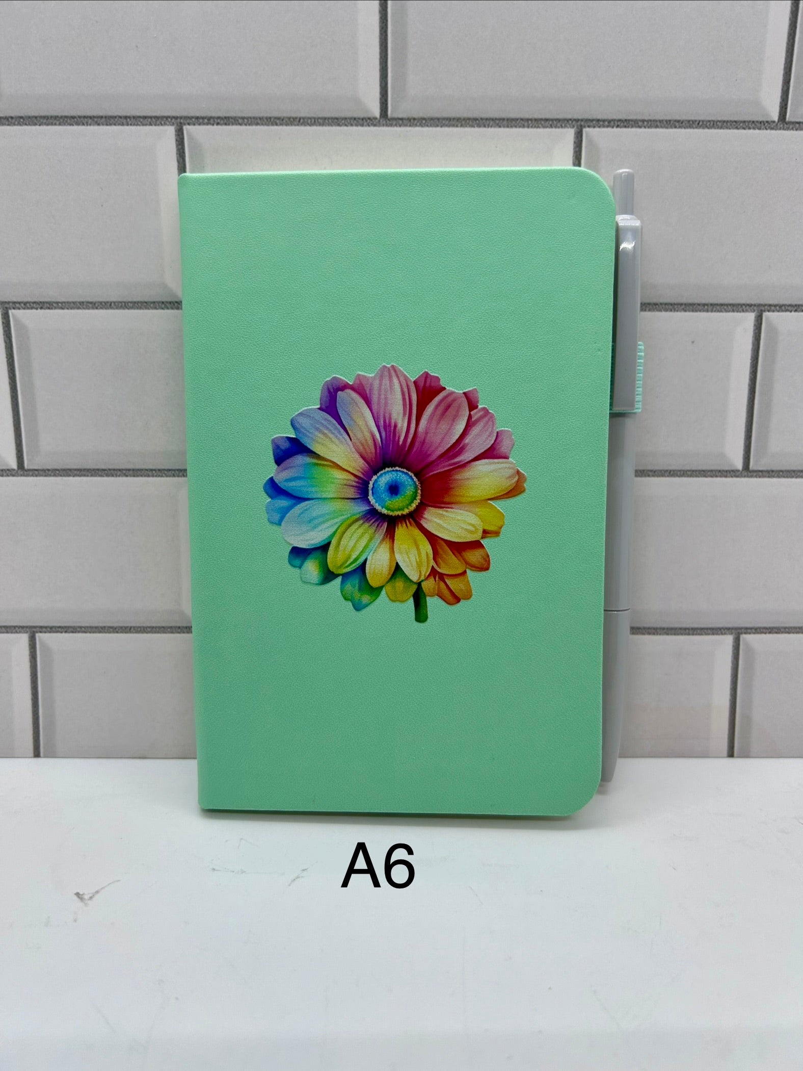 Carnet ligné A6 avec un magnifique motif floral - Vert