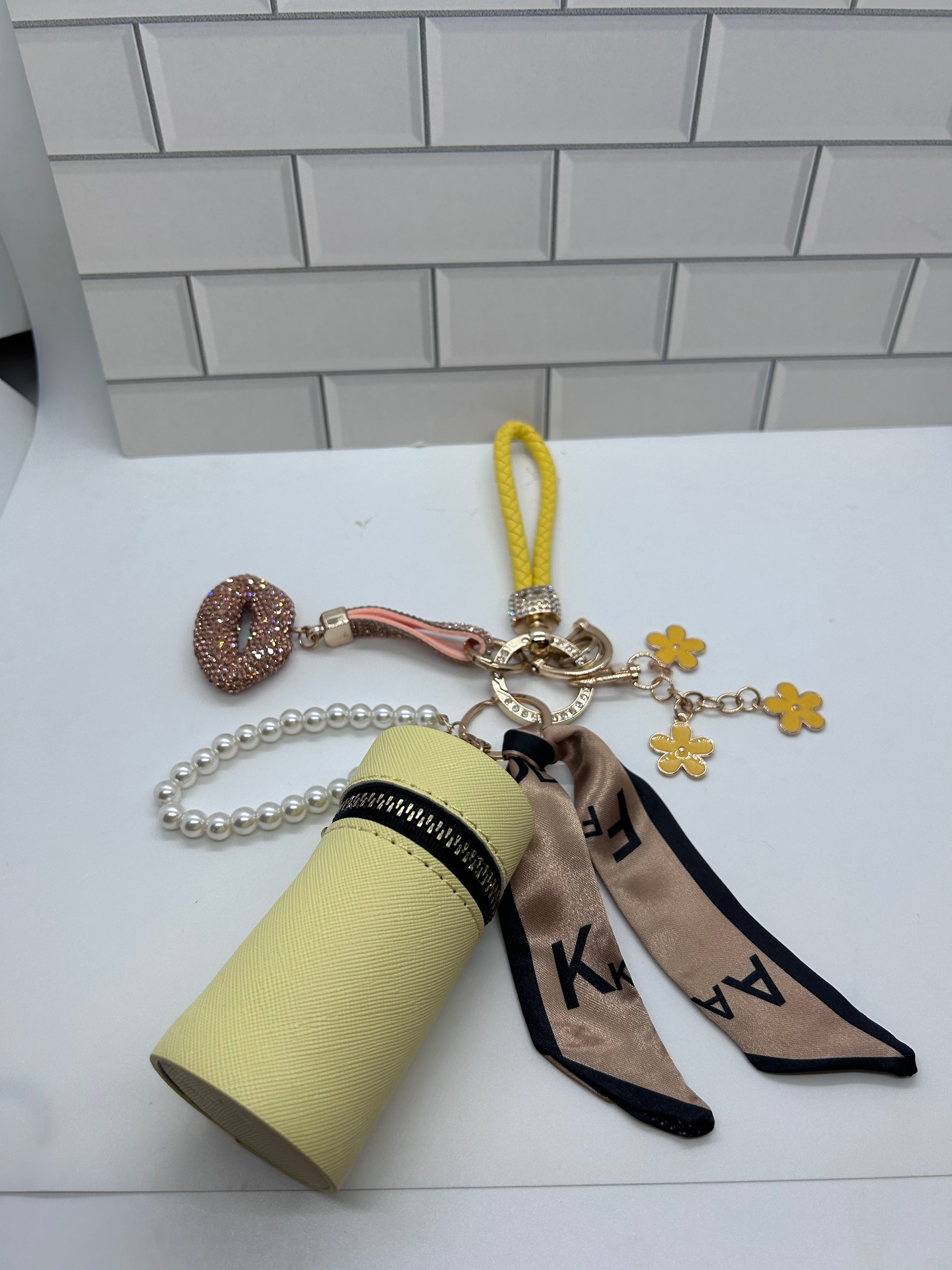 Yellow Wristlet Keychain Bundles-Yellow Cylindrical Bag, Yellow Charms, Champagne Lips Charm