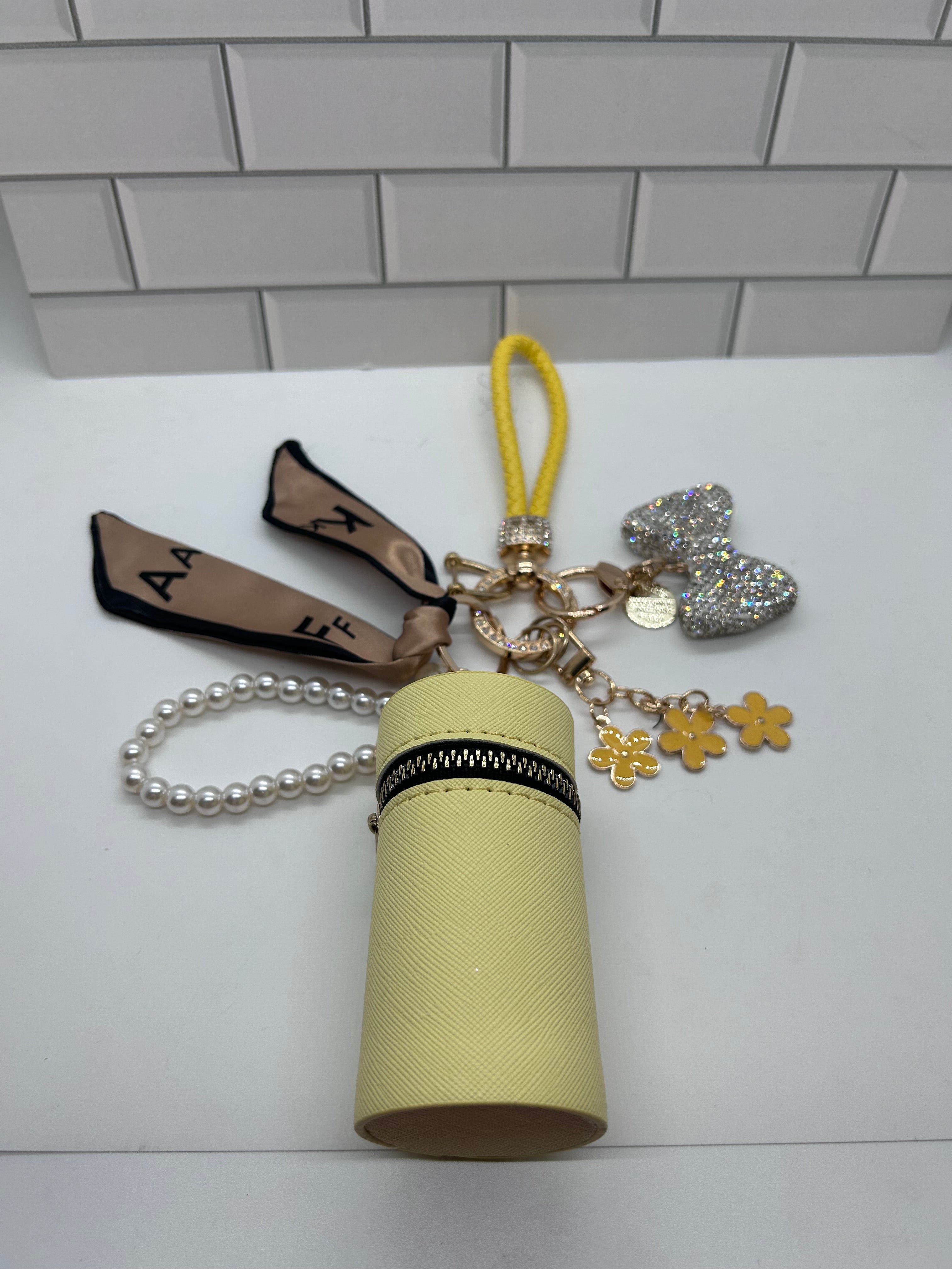 Yellow Wristlet Keychain Bundles-Yellow Cylindrical Bag, Yellow Charms, White Bow Charm