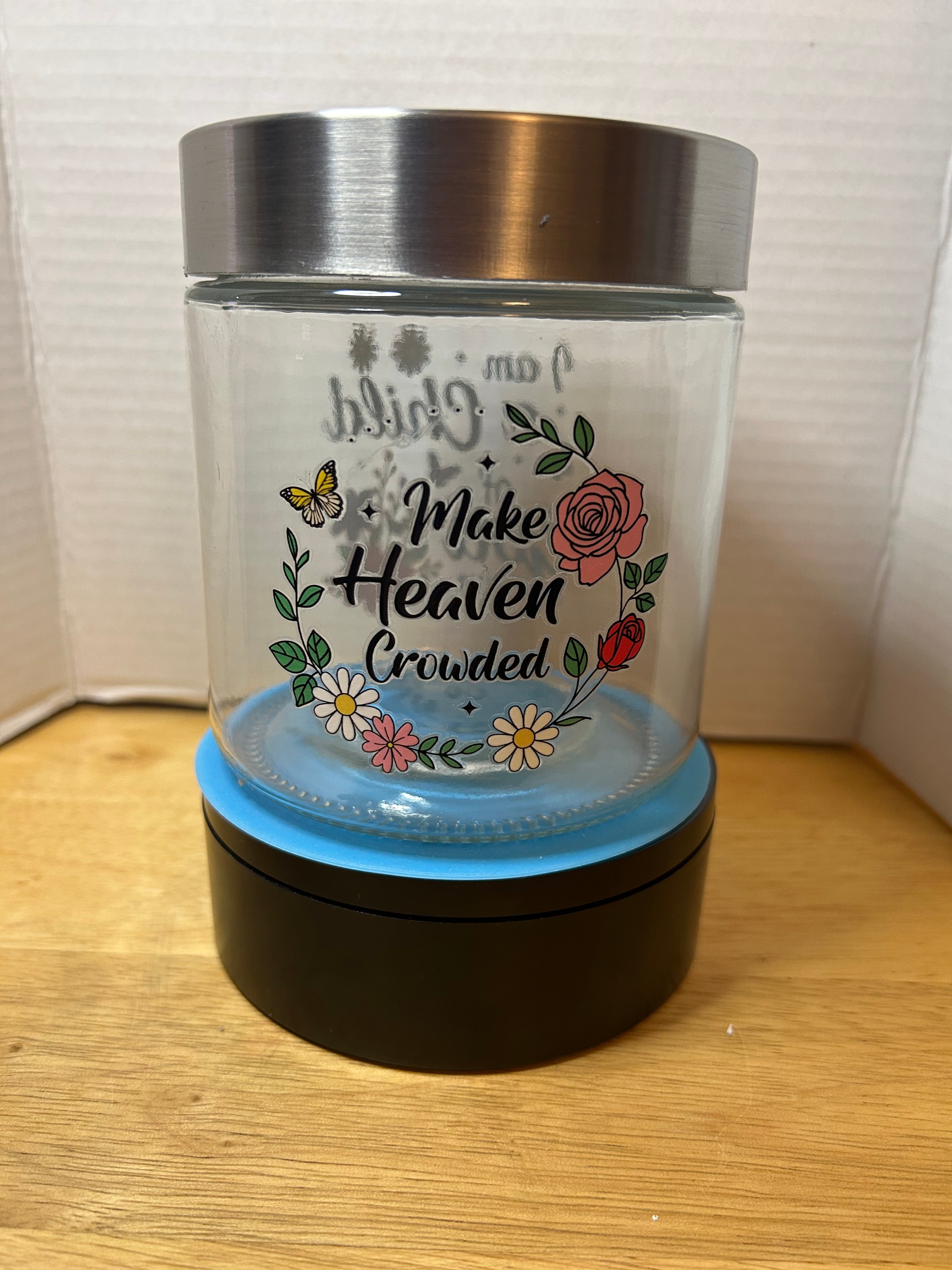 Petit bocal en verre avec couvercle en métal, orné d'un magnifique motif inspirant