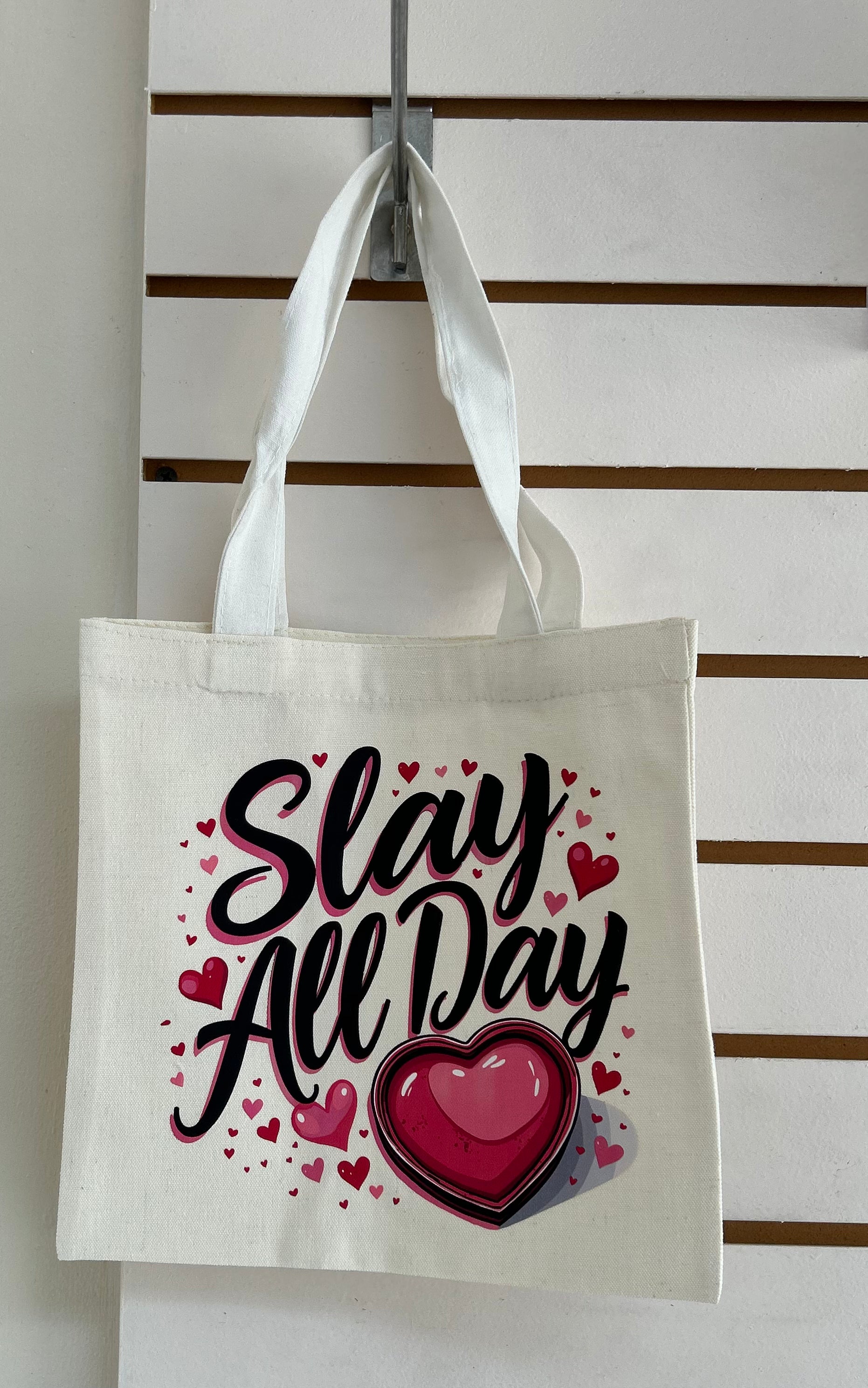 Mini sac fourre-tout en toile avec poignées blanches, orné d'un magnifique motif de maquillage. 25x25 cm