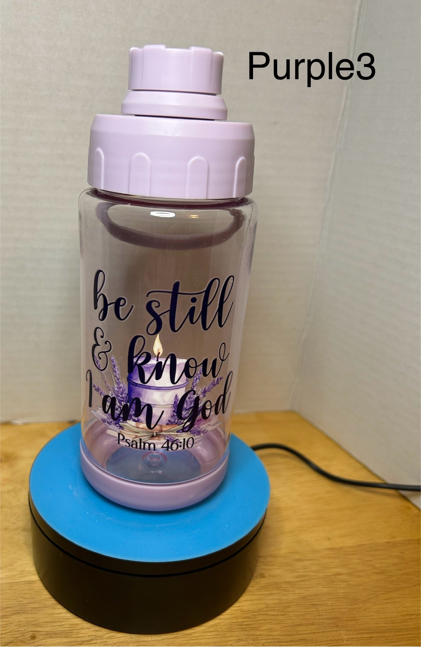 14 oz Plastic Water Bottle with Handle and Screw on Lid featuring a Beautiful Design