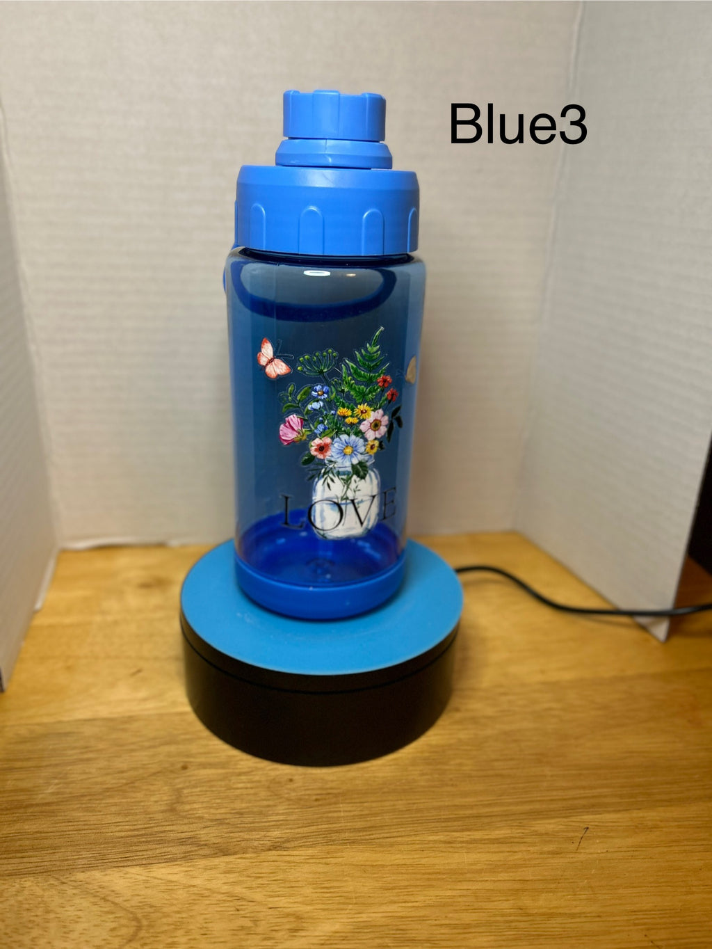 14 oz Plastic Water Bottle with Handle and Screw on Lid featuring a Beautiful Design
