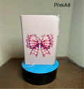 A6 Blank Lined Journal Featuring A beautiful Bow Design-Pink