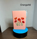 Carnet ligné A6 avec un magnifique motif floral-Orange