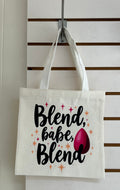 Mini sac fourre-tout en toile avec poignées blanches, orné d'un magnifique motif de maquillage. 25x25 cm