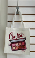 Mini sac fourre-tout en toile avec poignées blanches, orné d'un magnifique motif de maquillage. 25x25 cm