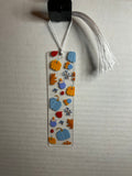 Acrylic Bookmark With Colored Tassel Featuring a Christmas Theme