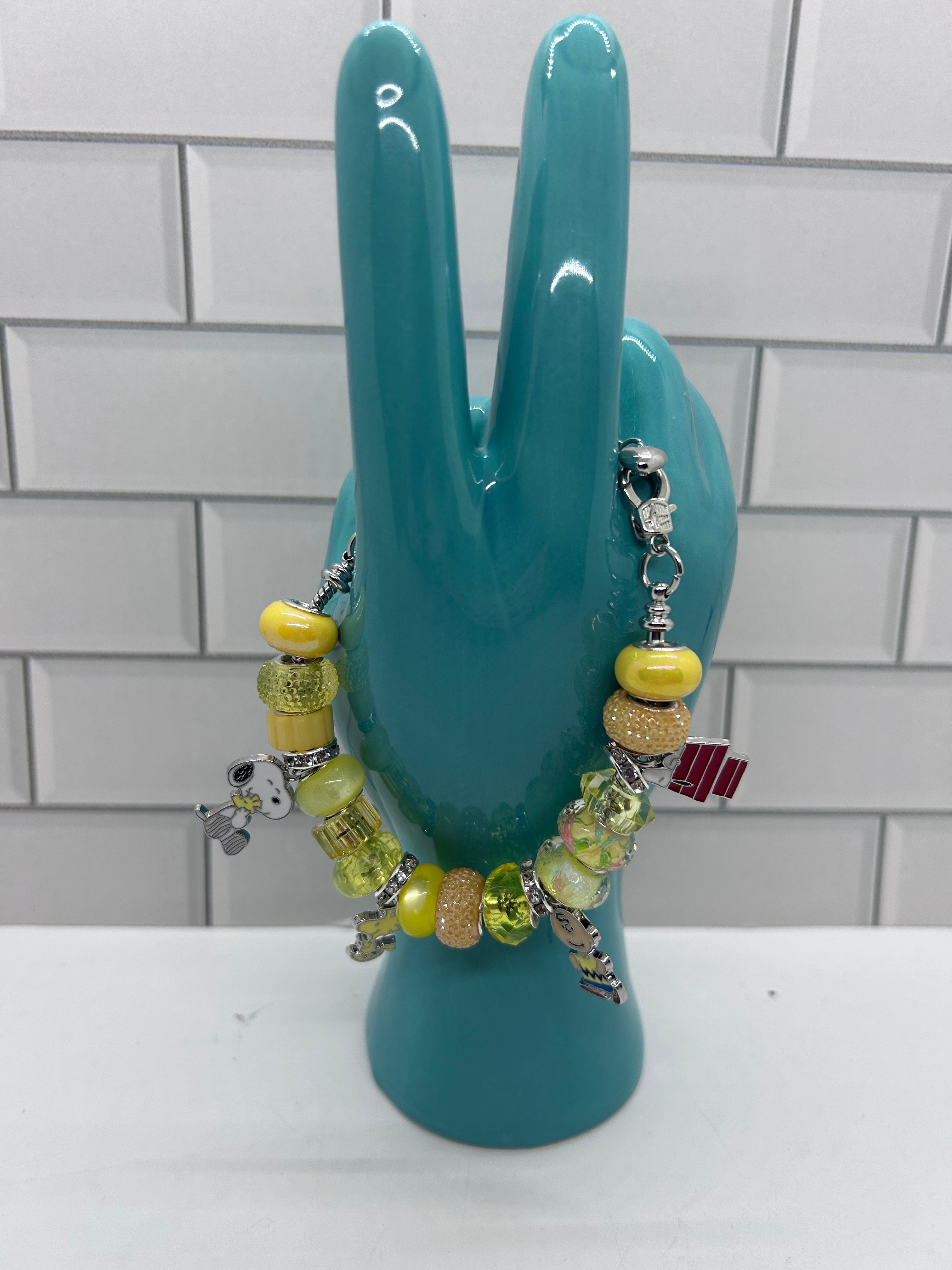 Beaded Silver Bracelet-Yellow Acrylic Beads with “Peanuts” Theme Charms