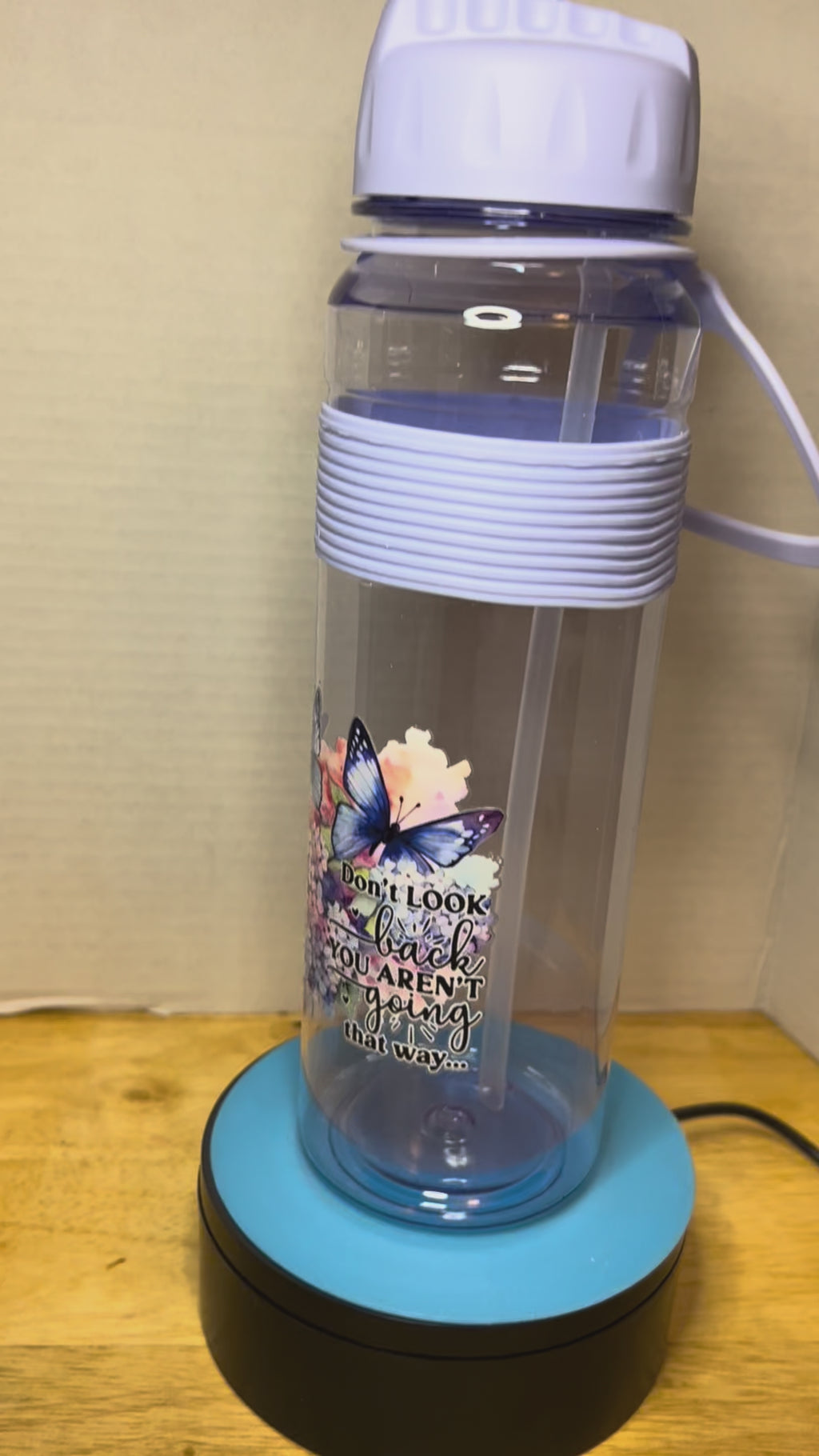 30 oz Plastic Water Bottle with Handle and Straw featuring a Beautiful Design