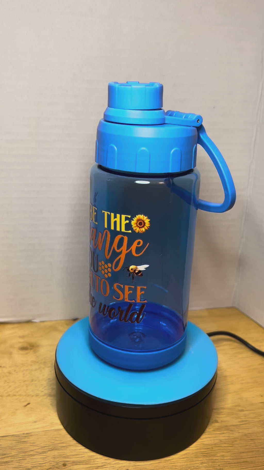14 oz Plastic Water Bottle with Handle and Screw on Lid featuring a Beautiful Design