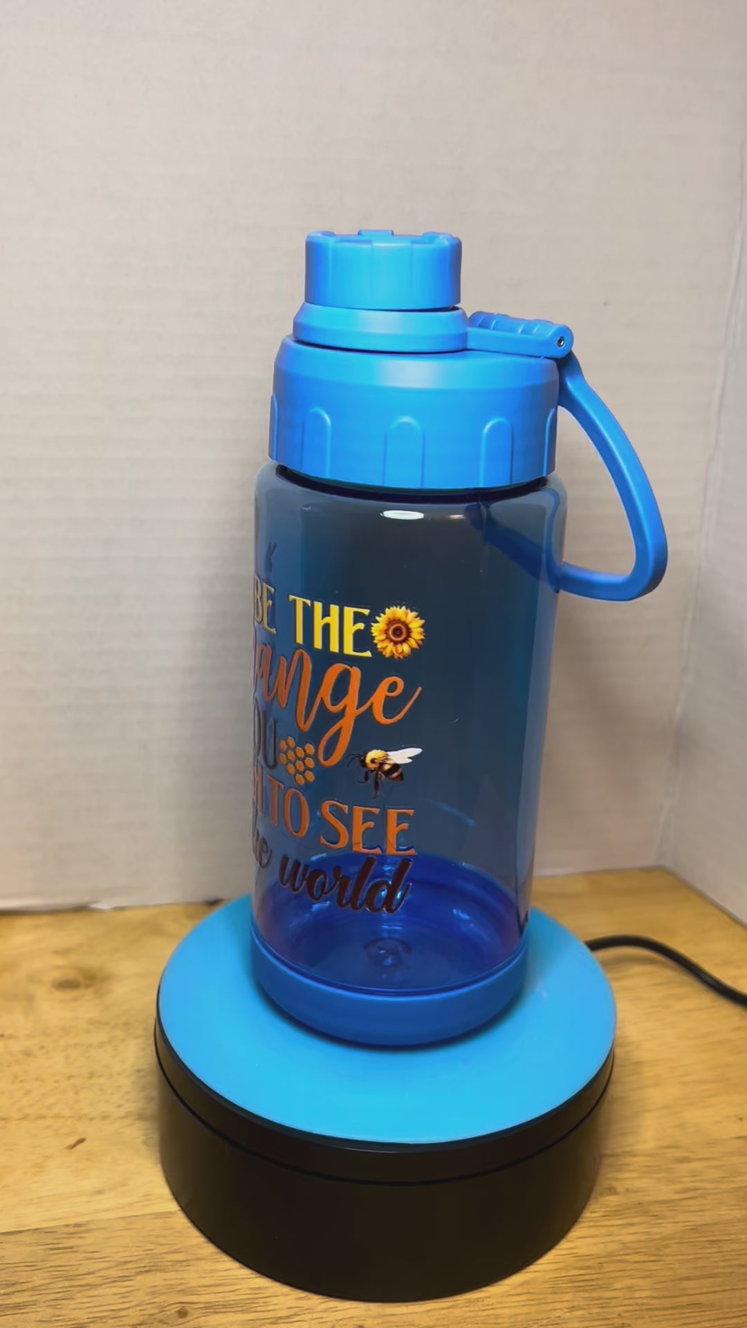 14 oz Plastic Water Bottle with Handle and Screw on Lid featuring a Beautiful Design