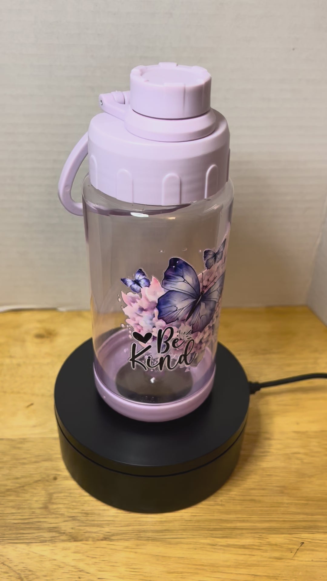 14 oz Plastic Water Bottle with Handle and Screw on Lid featuring a Beautiful Design