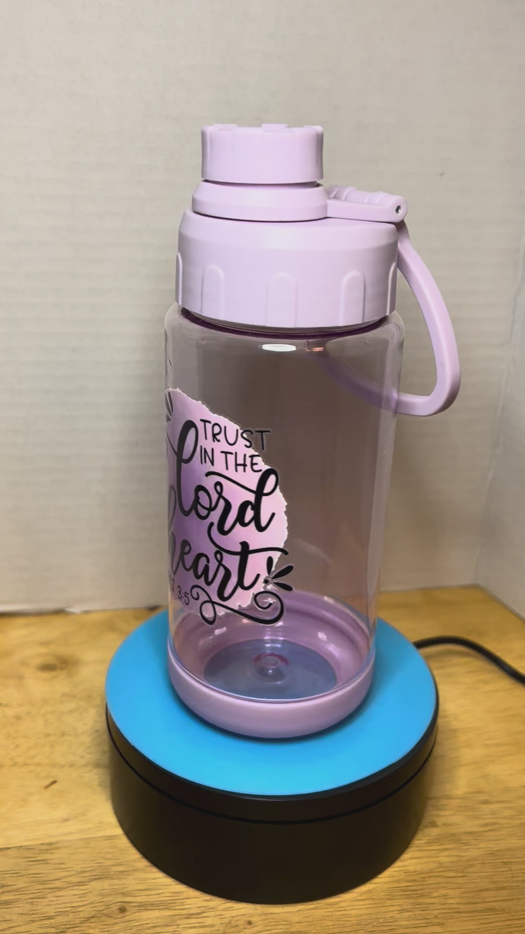 14 oz Plastic Water Bottle with Handle and Screw on Lid featuring a Beautiful Design