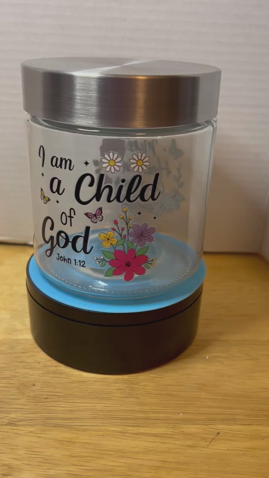 Petit bocal en verre avec couvercle en métal, orné d'un magnifique motif inspirant